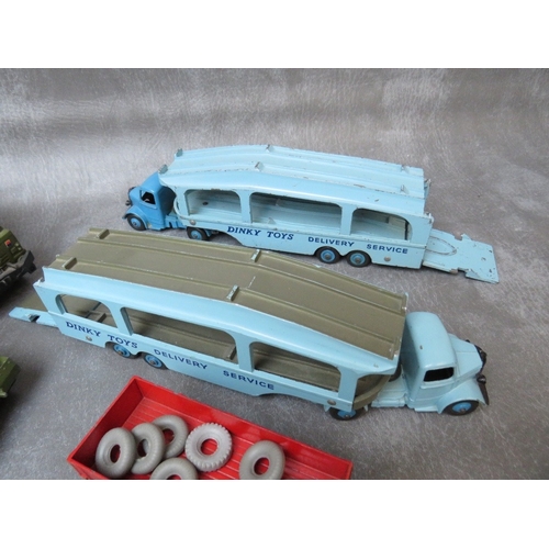 468 - A TRAY CONTAINING NINETEEN UNBOXED DINKY VEHICLES, to include two Pullmore car transporters, Cheifta... 