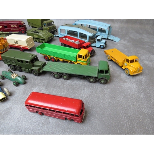 468 - A TRAY CONTAINING NINETEEN UNBOXED DINKY VEHICLES, to include two Pullmore car transporters, Cheifta... 