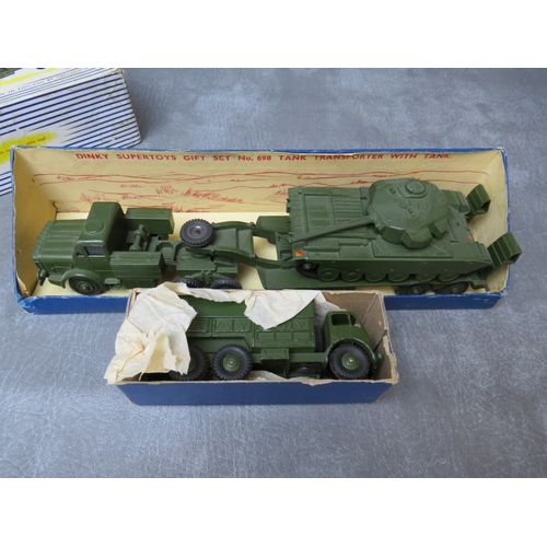 469 - A TRAY CONTAINING FIVE BOXED VINTAGE DINKY VEHICLES, to include tank transporter and tank 698, AEC t... 