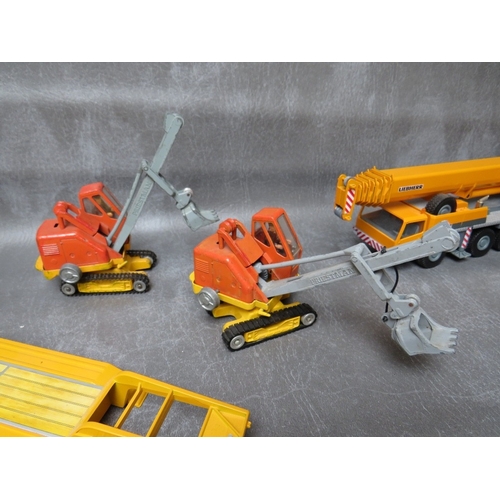 481 - TEN UNBOXED CRANES, TRACTORS, DIGGERS AND HEAVY HAULAGE, various makes to include Conrad, Matchbox, ... 