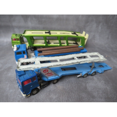 484 - FOUR UNBOXED ARTICULATED LORRIES AND TRAILERS / TANKERS, together with two Corgi Major car transport... 