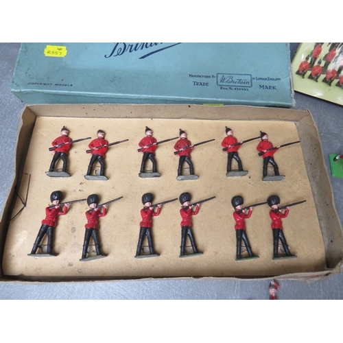 426 - A BOXED SET OF TWELVE BRITAINS LEAD SOLDIERS, footguards and infantry of the line set 5A, together w... 