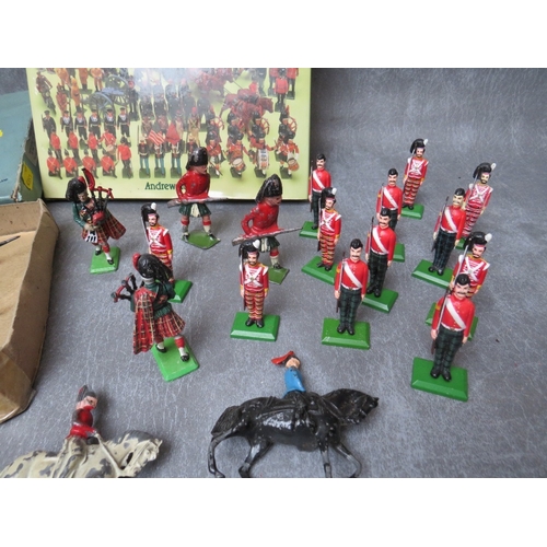 426 - A BOXED SET OF TWELVE BRITAINS LEAD SOLDIERS, footguards and infantry of the line set 5A, together w... 