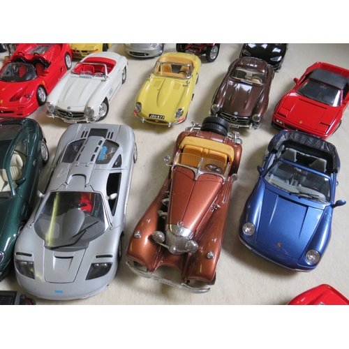 489 - A COLLECTION OF UNBOXED DIE CAST CARS AND FIGURES, cars mainly 1:18 scale by Burago, Maisto etc., fi... 