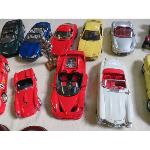 489 - A COLLECTION OF UNBOXED DIE CAST CARS AND FIGURES, cars mainly 1:18 scale by Burago, Maisto etc., fi... 