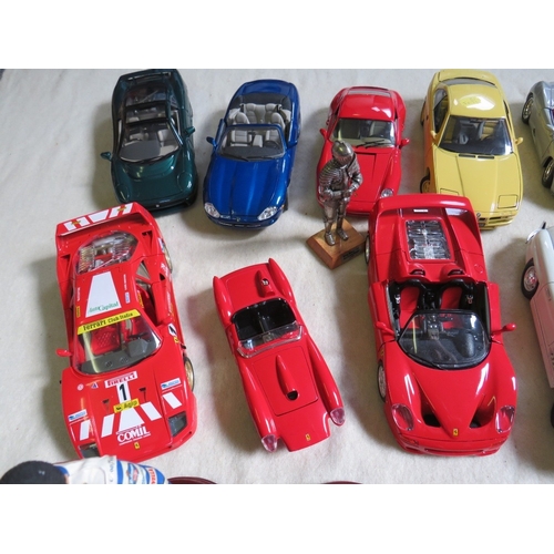 489 - A COLLECTION OF UNBOXED DIE CAST CARS AND FIGURES, cars mainly 1:18 scale by Burago, Maisto etc., fi... 