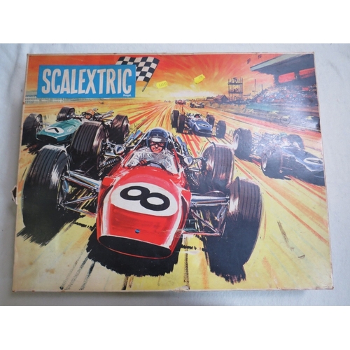 491 - A BOXED SCALEXTIC SET CLUB 60, together with two boxed Scalextric cars and a box of track