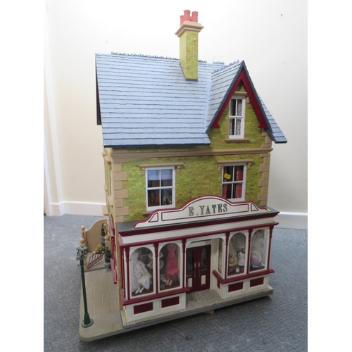 360 - AN EXCELLENT QUALITY ROTATING BASE DOLLS HOUSE, complete with fixed furniture, has shop frontage, H ... 