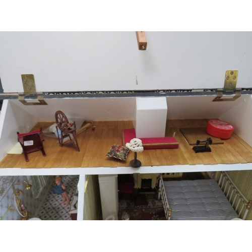 360 - AN EXCELLENT QUALITY ROTATING BASE DOLLS HOUSE, complete with fixed furniture, has shop frontage, H ... 