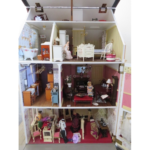 360 - AN EXCELLENT QUALITY ROTATING BASE DOLLS HOUSE, complete with fixed furniture, has shop frontage, H ... 