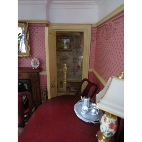 360 - AN EXCELLENT QUALITY ROTATING BASE DOLLS HOUSE, complete with fixed furniture, has shop frontage, H ... 