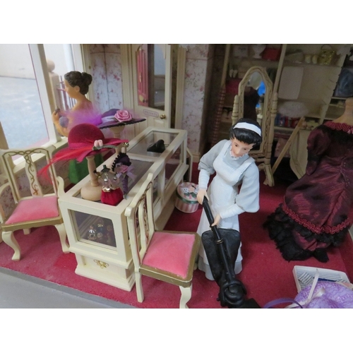 360 - AN EXCELLENT QUALITY ROTATING BASE DOLLS HOUSE, complete with fixed furniture, has shop frontage, H ... 