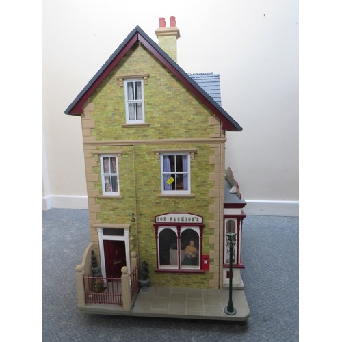 360 - AN EXCELLENT QUALITY ROTATING BASE DOLLS HOUSE, complete with fixed furniture, has shop frontage, H ... 