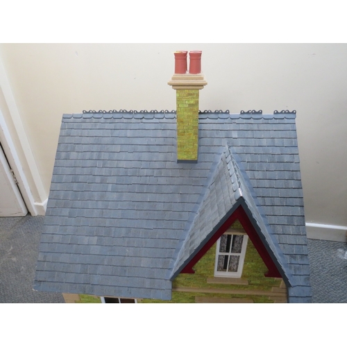 360 - AN EXCELLENT QUALITY ROTATING BASE DOLLS HOUSE, complete with fixed furniture, has shop frontage, H ... 