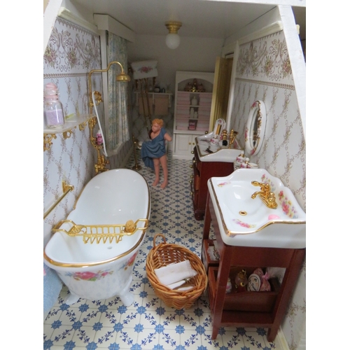 360 - AN EXCELLENT QUALITY ROTATING BASE DOLLS HOUSE, complete with fixed furniture, has shop frontage, H ... 