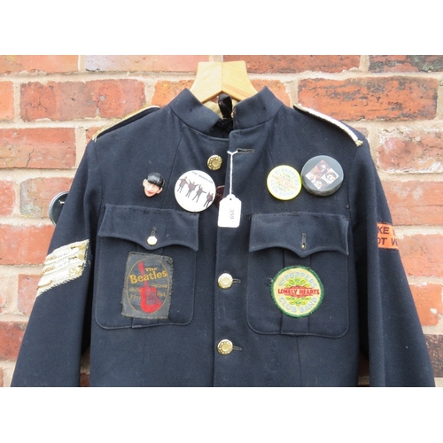 359 - A VINTAGE BEATLES THEMED JACKET, with various badges and patches attached