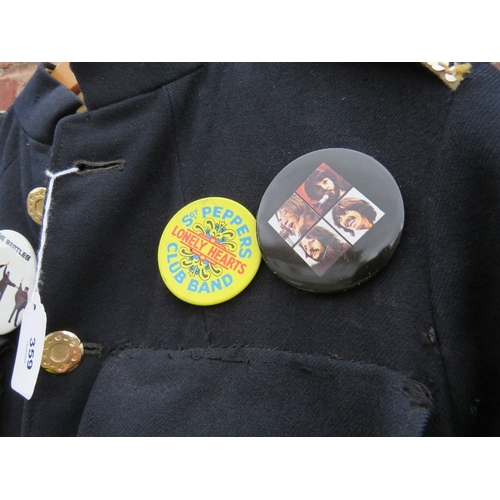 359 - A VINTAGE BEATLES THEMED JACKET, with various badges and patches attached