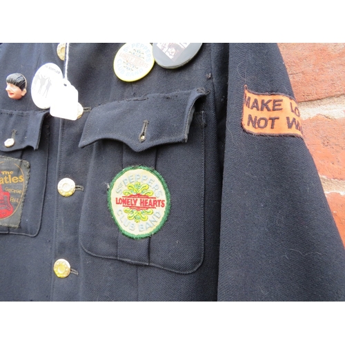 359 - A VINTAGE BEATLES THEMED JACKET, with various badges and patches attached