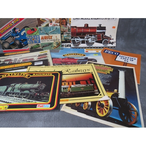 422 - A COLLECTION OF ASSORTED VINTAGE RAILWAY MODEL CATALOGUES & EPHEMERA ETC., together with a two Airfi... 