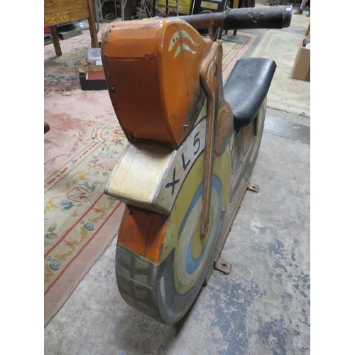 538 - A FAIRGROUND PAINTED WOOD CAROUSEL MOTORBIKE, with polychrome decoration, on metal bracket stand (Re... 