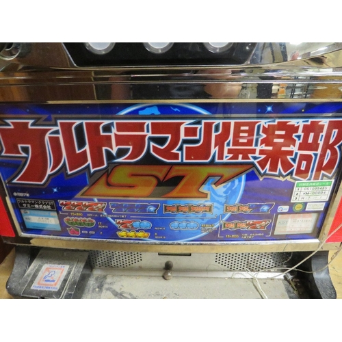 541 - A JAPANESE ELECTRONIC REEL TABLE TOP FRUIT MACHINE, with glazed top front panel, set up for token op... 