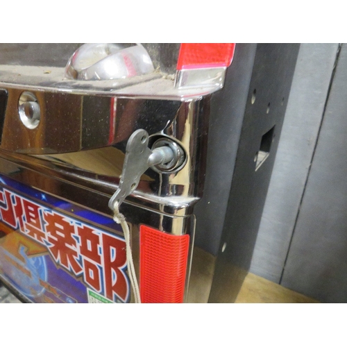 541 - A JAPANESE ELECTRONIC REEL TABLE TOP FRUIT MACHINE, with glazed top front panel, set up for token op... 