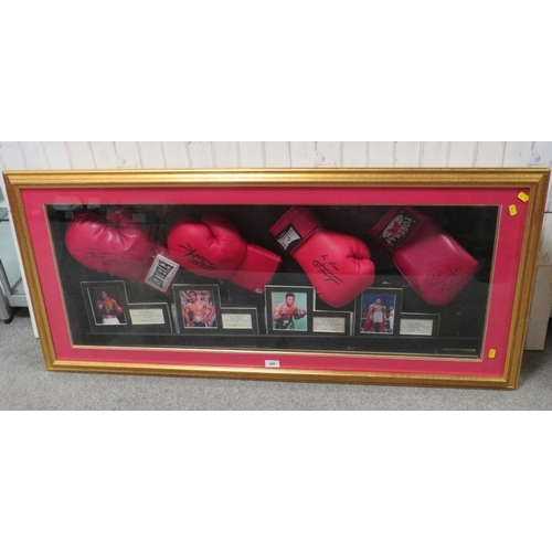 308 - FOUR FRAMED AMERICAN HEAVYWEIGHT WORLD CHAMPION SIGNED BOXING GLOVES, to include Joe Frazier, George... 