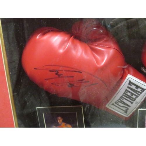 308 - FOUR FRAMED AMERICAN HEAVYWEIGHT WORLD CHAMPION SIGNED BOXING GLOVES, to include Joe Frazier, George... 