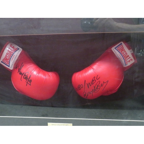 311 - FRAMED HENRY COOPER AND NIGEL BENN BOXING GLOVES, both autographed