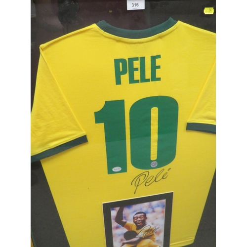 316 - A FRAMED PELE FOOTBALL SHIRT AND PHOTOGRAPH, both signed