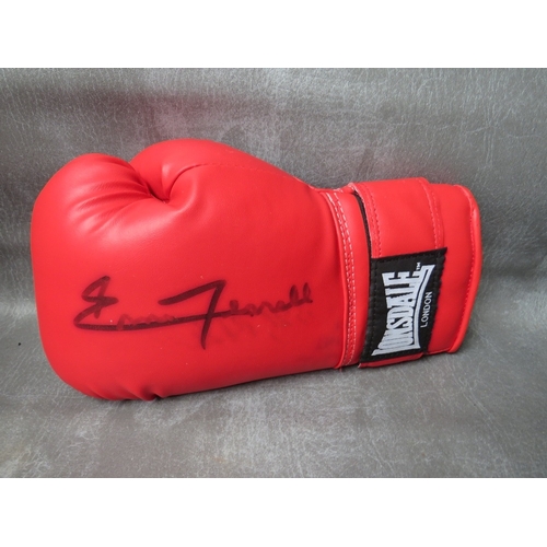 318 - THREE SIGNED BOXING GLOVES, to include Frank Bruno, Riddick Bowe and Ernie Terrell