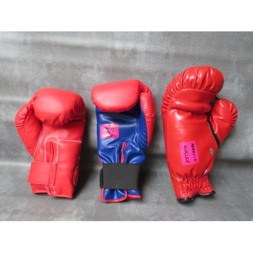 322 - THREE SIGNED BOXING GLOVES, to include Ray Leonard, Marvin Hagler and Jake La Motta