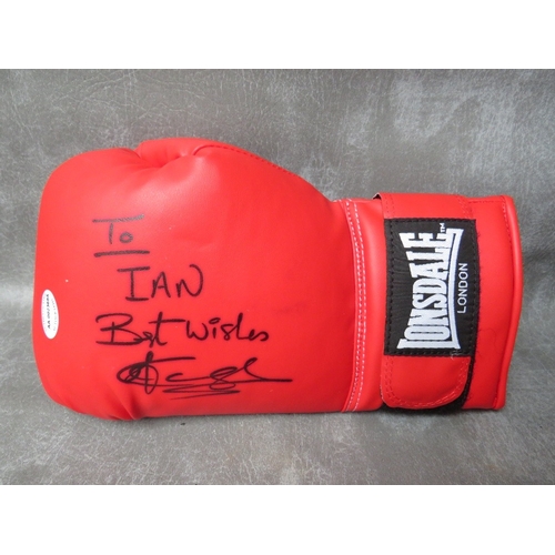 323 - THREE SIGNED BOXING GLOVES, to include Joe Calzaghe, Chris Eubank and Michael Watson