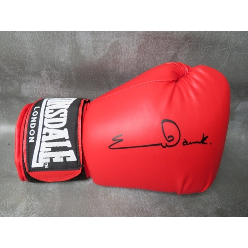 323 - THREE SIGNED BOXING GLOVES, to include Joe Calzaghe, Chris Eubank and Michael Watson