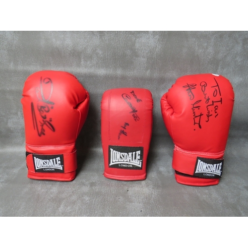 324 - THREE SIGNED BOXING GLOVES, to include Alan Minter, Dave Boy Green and Dave Courtney / Roy Shaw