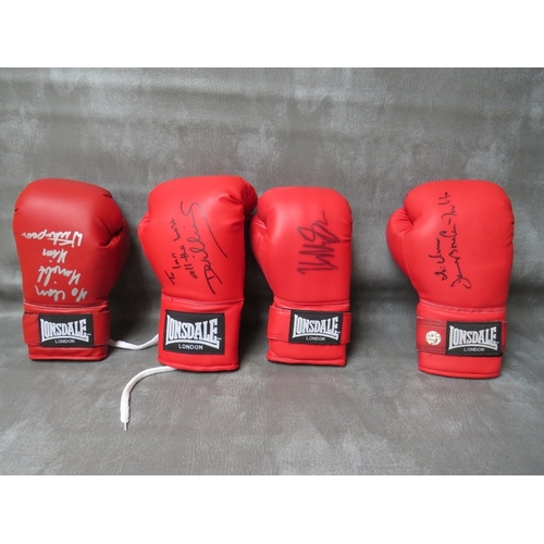 326 - FOUR SIGNED BOXING GLOVES, to include Tim Witherspoon, James Bonecrusher Smith, Mike Tyson and Danny... 