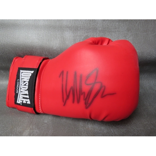 326 - FOUR SIGNED BOXING GLOVES, to include Tim Witherspoon, James Bonecrusher Smith, Mike Tyson and Danny... 