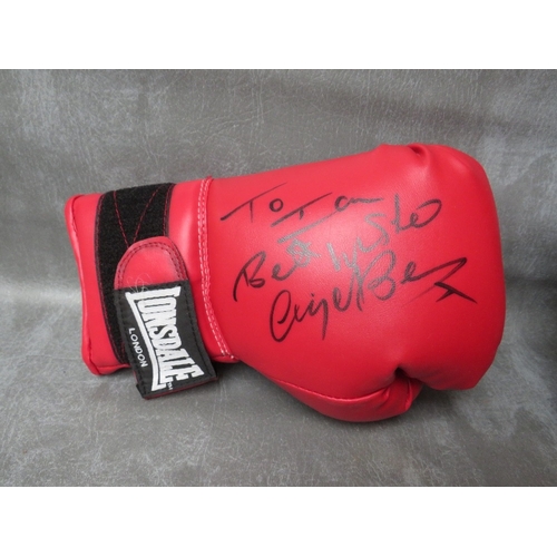 327 - THREE SIGNED BOXING GLOVES, to include Richie Woodhall, Nigel Benn and Roberto Duran