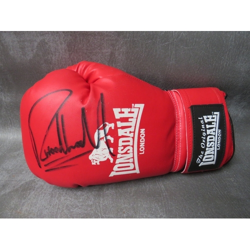 327 - THREE SIGNED BOXING GLOVES, to include Richie Woodhall, Nigel Benn and Roberto Duran