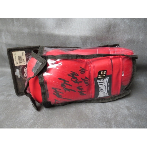 328 - SEVEN SIGNED BOXING GLOVES, to include Rubin Hurricane Carter, Shaun Walton etc