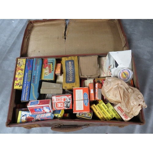 424 - A LARGE LEATHER CASE FULL OF VINTAGE MAGIC TRICKS