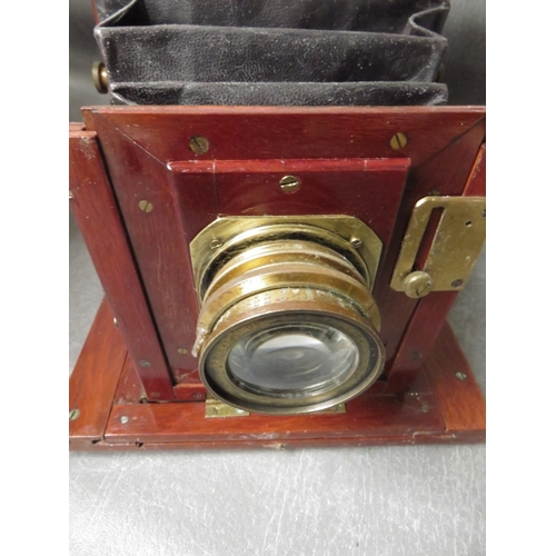 497 - TWO LATE 19TH CENTURY PLATE CAMERAS, to include a large 10