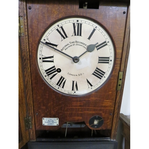 502 - A NATIONAL TIME RECORDER OAK CASED CLOCKING IN CLOCK, H 87 cm