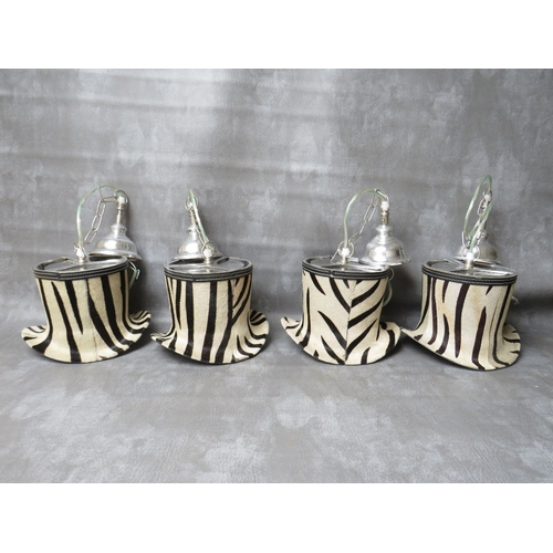 508 - A SET OF FOUR UNUSUAL DESIGNER ZEBRA PATTERN TOP HAT PENDANT LIGHTS, in chrome and faux zebra fur