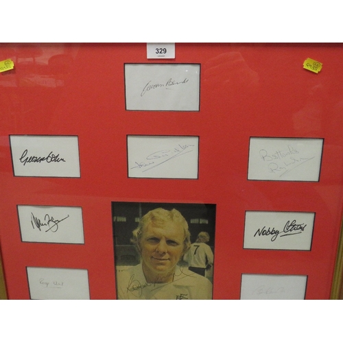 329 - A FRAMED 1966 ENGLAND FOOTBALL WORLD CUP WINNING PICTURE OF BOBBY MOORE, signed along with all ten o... 