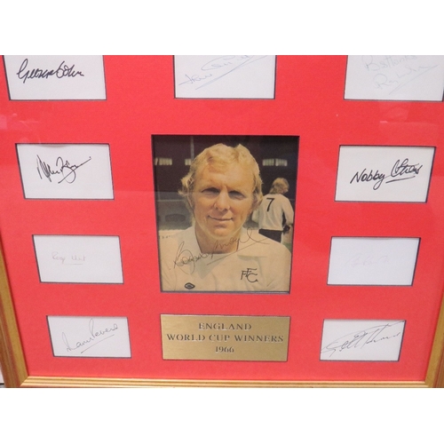 329 - A FRAMED 1966 ENGLAND FOOTBALL WORLD CUP WINNING PICTURE OF BOBBY MOORE, signed along with all ten o... 