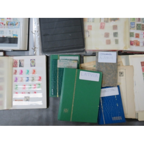 165 - THIRTEEN LARGE STAMP ALBUMS / STOCKBOOKS, containing East German, Chinese, Egyptian, Latvian and Bri... 