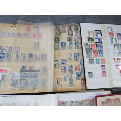 170 - TWELVE STAMP ALBUMS / STOCKBOOKS, containing stamps from France, Germany, Holland, Poland etc.