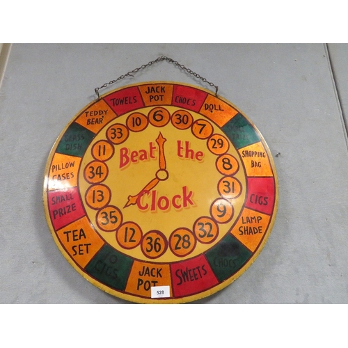 528 - A VINTAGE WOODEN 'BEAT THE CLOCK' CIRCULAR GAME BOARD, Dia. 56 cm