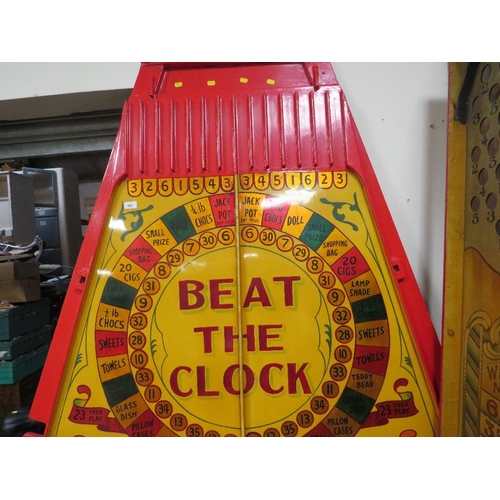 565 - A MID 20TH CENTURY PAINTED WOOD FAIRGROUND ROLL A BALL GAME BOARD, mainly in red and yellow, 144 cm ... 